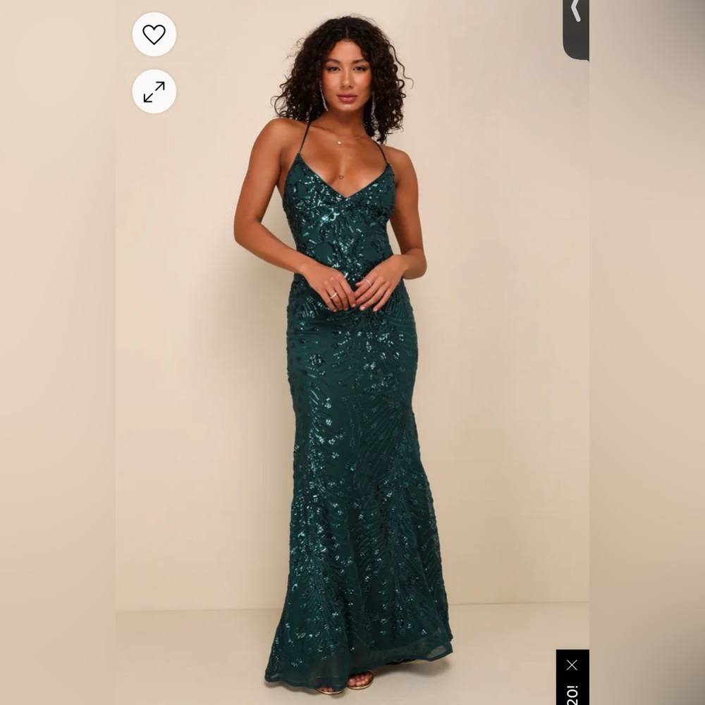 green sequin dress with a corset style back